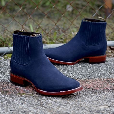 navy blue square toe boots.